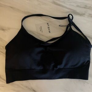 Open back black NVGTN sports bra
